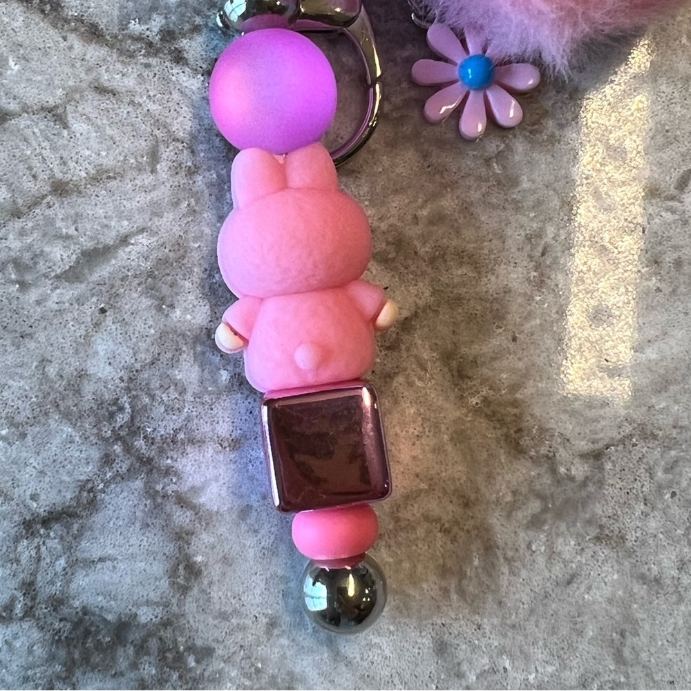 Pink Silicone Labubu Keychain with Pom Pom and Floral Accent - Picture 6 of 8